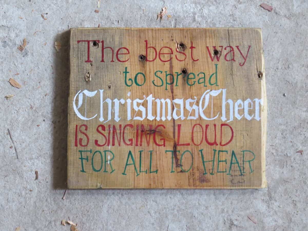 Recycled wood becomes a Holiday Sign full of Christmas Cheer