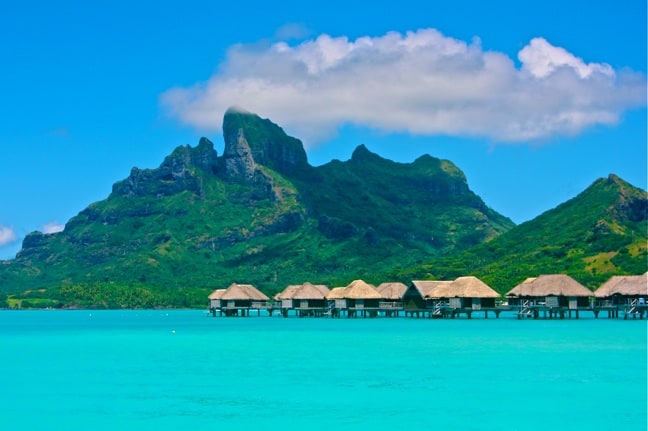 Over-water bungalows at the Four Seasons Resort, Bora Bora. -Polynesian Islands to Visit in the Polynesian Triangle