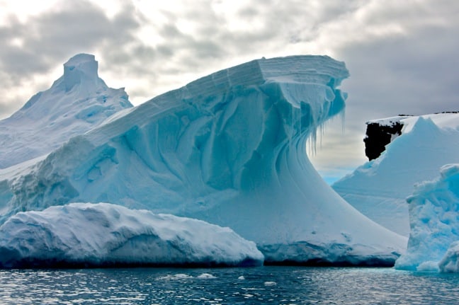 The Haunting Beauty of Icebergs in Antarctica